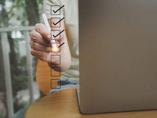 Wall Mural - businessman who chooses the correct answer in the exam evaluate the questionnaire online survey test