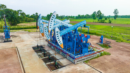 Wall Mural - Top view In the field crude oil country industry the oil rig pump in the evening of the pumping unit