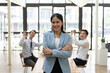 © PaeGAG - Young Asian businesswoman celebrating success with her coworker in the office room.