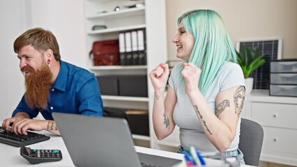 Poster - Man and woman business workers using laptop and computer high five for achievement at office