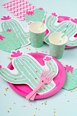 Wall Mural - Cute paper party plates in the shape of cactus with cups for themed party. Hawaiian Birthday party decorations. Set of holiday disposable tableware for party or picnic. Aloha Party Kits.