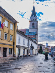 Wall Mural - Kranj village tiled street, colorful houses and clock tower, Kranj, Slovenia