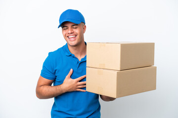 Wall Mural - Delivery caucasian man isolated on white background smiling a lot