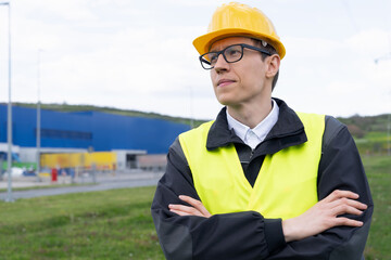 Poster - Portrait of engineer in helmet and glasses	