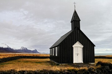 Wall Mural - Aerial view of black Budakirkja church in Iceland