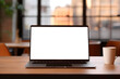 © Yuliia - laptop with transparent screen on table with blurred background, laptop mockup png for any image on screen, generative ai