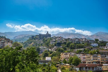 Sticker - Aerial view of the Gjirokaster old town on the background of the hills