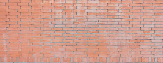 Wall Mural - Brick wall background texture, close up. Red brown color bricks, banner. Building facade detail.