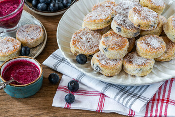 Canvas Print - Traditional fennel Welsh cakes with blueberry coulis