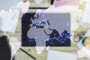 Poster - Abstract creative digital world map and modern digital tablet on desktop on background, top view, globalization concept. Multiexposure
