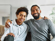© Lumos sp - father son family man child portrait parent boy happy together teen love dad togetherness hugging male bonding care black home childhood teen teenager adolescence
