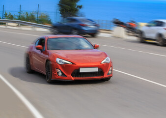 Wall Mural - red sports car rushes along the highway