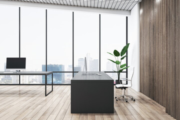Poster - Stylish workspace black table side view in coworking office with modern computers, city skyline view background from panoramic window and green plant on wooden parquet floor. 3D rendering