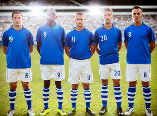 Soccer team standing on field