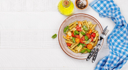 Wall Mural - Italian pasta adorned with fresh tomatoes and aromatic basil