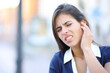 © PheelingsMedia - Stressed woman complaining suffering earache