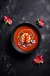 Lobster bisque soup meal on black stone surface background. Generative AI