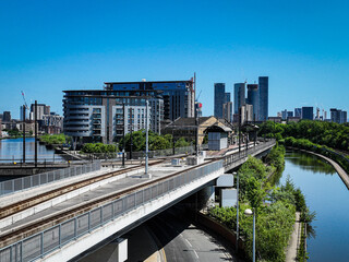 Canvas Print - Main Railway Arterial Route into Downtown Manchester with Manchester Ship Canal 