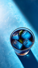 Wall Mural - Close-up of a blue drink shot from above, made with generative AI