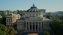 Drone Shot Of The Romanian Athenaeum On A Sunny Day In Bucharest, Romania