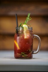 Canvas Print - Vertical shot of a glass of cocktail on a table