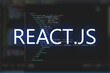 © Bibou Design - React Js inscription against  code background. Technology concept. Learn react programming language, web development.