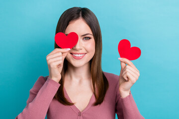 Sticker - Portrait photo of young happy girl wear pink shirt cover face two small postcard valentine day romance isolated on blue color background