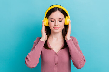 Poster - Photo of young relaxed girl wear apple airpods pro wireless stylish pink shirt closed eyes chill isolated on aquamarine color background