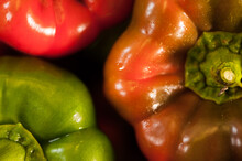 Fresh Green, Red, And Orange Organic Bell Peppers, Closeup