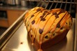 heart-shaped loaf with salted caramel drizzle and chocolate chips, created with generative ai
