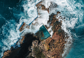 Wall Mural - north curl curl rock pool with incoming waves.