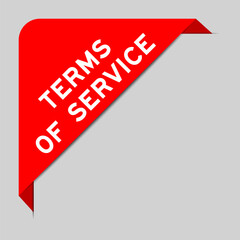 Sticker - Red color of corner label banner with word terms of services on gray background