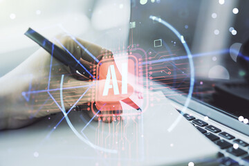 Poster - Double exposure of creative artificial Intelligence abbreviation with hand writing in notepad on background with laptop. Future technology and AI concept