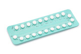 Fototapeta  - Oral contraceptive pills isolated on white background