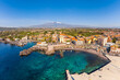 View of Stazzo old city, Catania, Sicily, Italy. Summer beach and sea