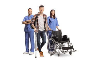 Sticker - Young male patient with leg injury standing in front of health care workers with a wheelchair