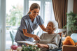 Young nurse assisting a senior in a nursing home. Elderly patient care concept. Generative AI
