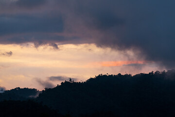 Wall Mural - Cloud forest sunset, Mindo cloud forest, Ecuador.