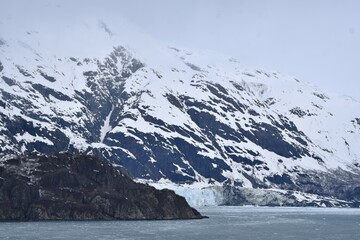 Wall Mural - Snow covered cliffs in Glacier Bay Alaska