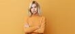 © MarianoMartin - Blond woman crossed arms looking at camera with skeptical expression.  Image generative AI.