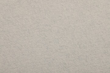 Texture of light grey paper sheet as background, top view