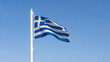 Greek flag blowing in the wind, Crete Greece