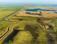 Aerial View Of Grassland And Reed Swamp In Newly Developed Nature Reserve Tetjehorn, 't Roegwold, Province Of Groningen, The Netherlands.