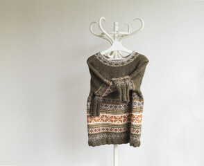 Wall Mural - Icelandic wool knitted lopapeysa sweater, brown pullover in traditional Nordic knitting pattern