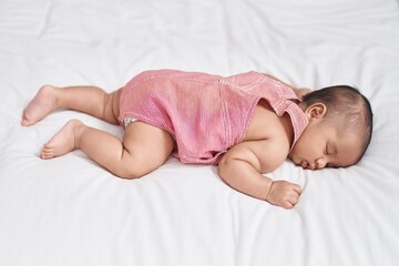 Poster - Adorable infant lying on bed sleeping at bedroom