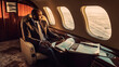 © PaulShlykov - Smiling businessman looking at window in private plane. Business jet interior. Generative AI
