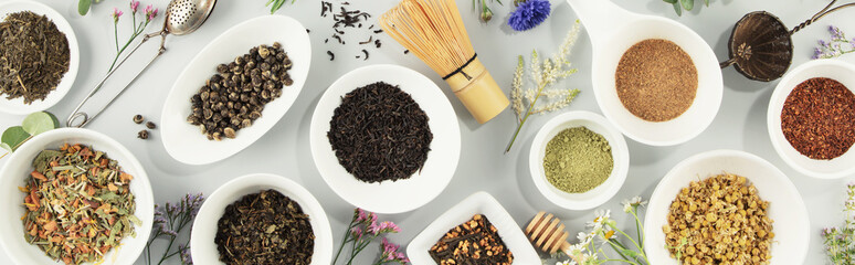 Poster - assortment of dry tea in white ceramic bowls