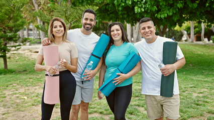 Poster - Group of people smiling confident holding yoga mat at park