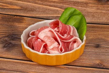 Sticker - Sliced pork bacon in the bowl