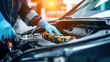 © sopiangraphics - Selective focus hands in gloves of expert technicain electric car, EV car while opened A used Lithium-ion car battery before its repair. Generative Ai